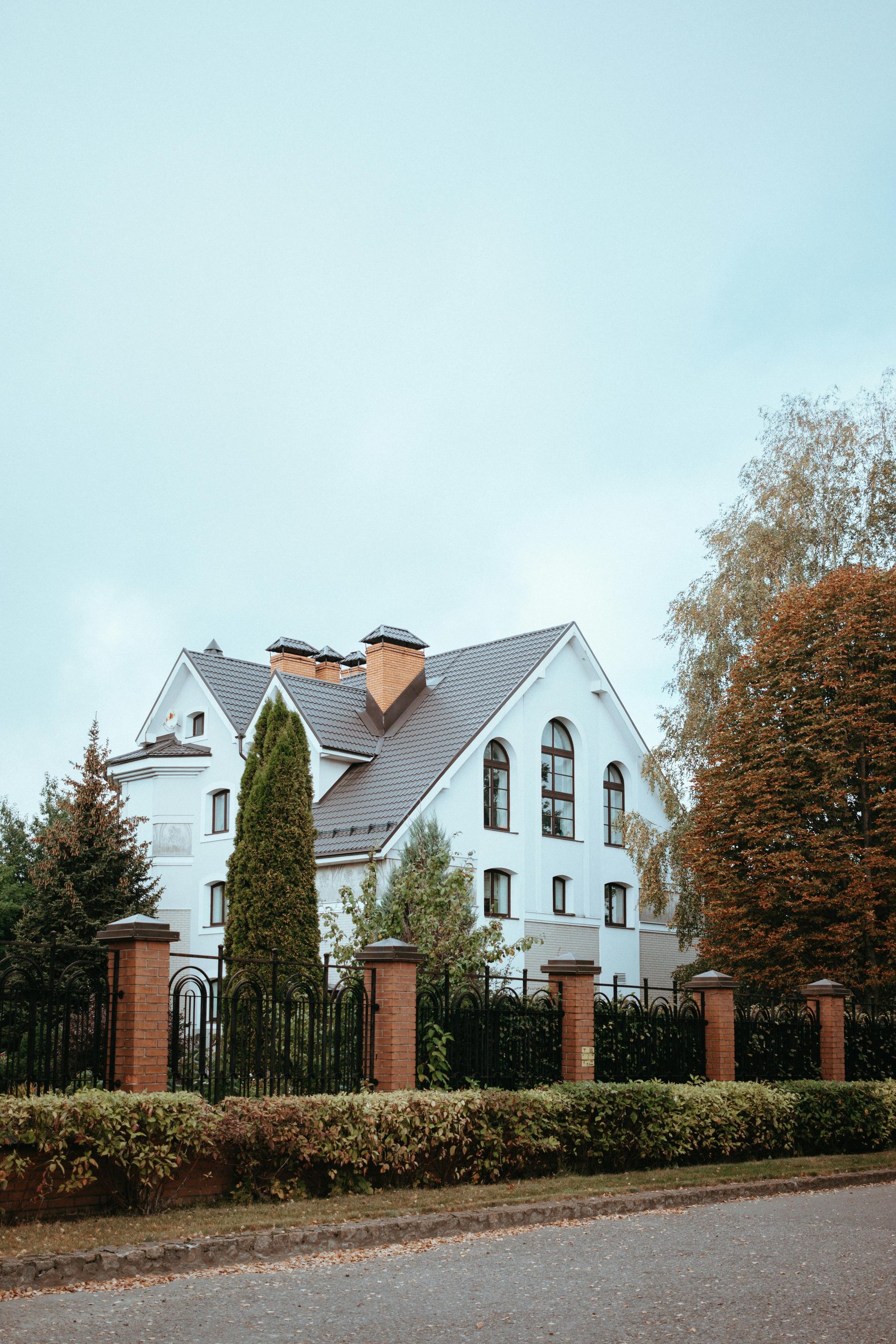 A house photographed as a site, not a listing.