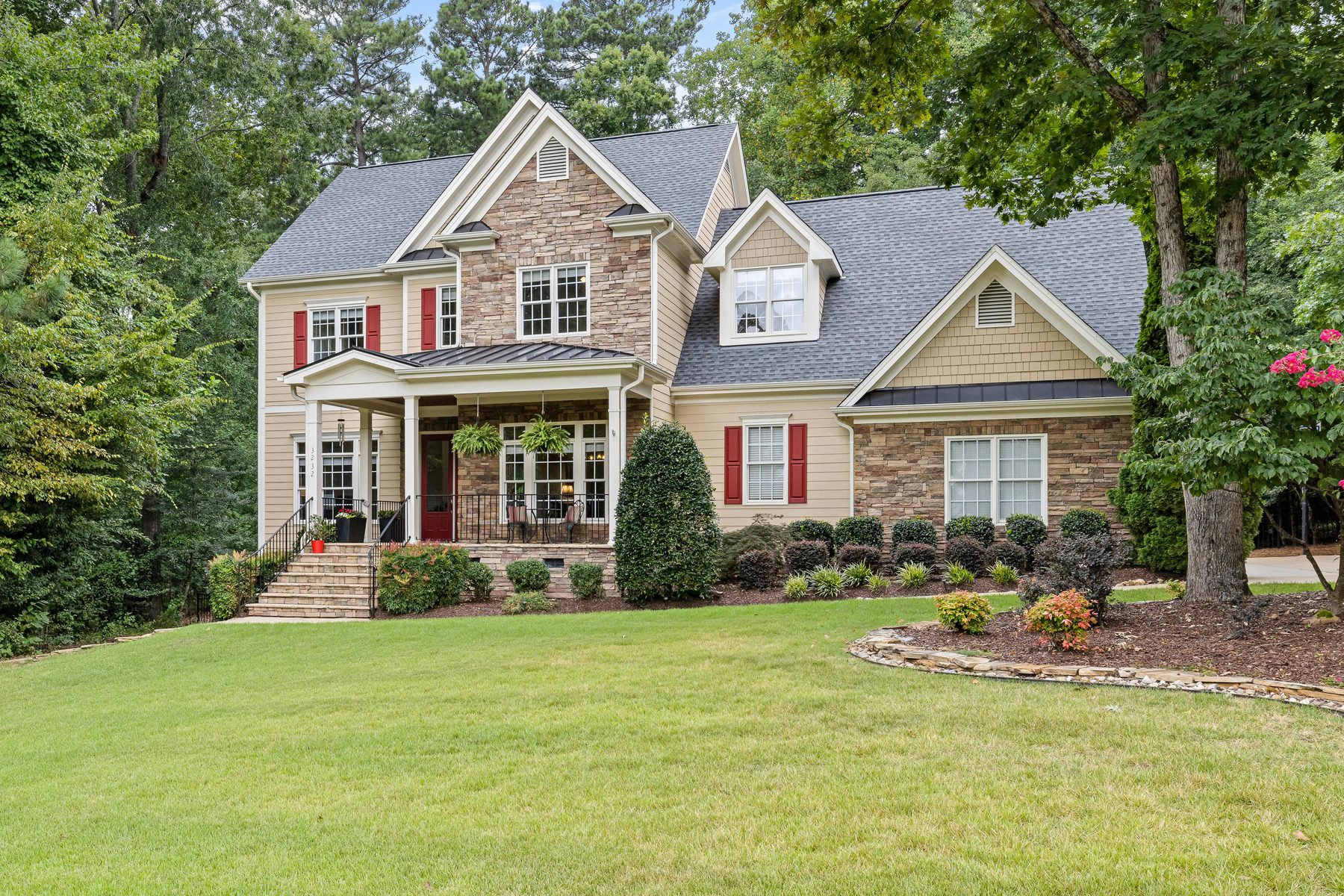A house photographed as a site, not a listing.